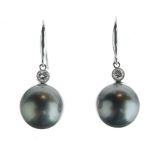Pair of South Sea black cultured pearl and diamond drop earrings, the white fittings stamped '