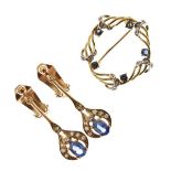 Pair of sapphire and diamond drop clip-on earrings, stamped '9ct' to the clip fittings, the oval cut