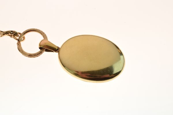 Victorian oval locket, unmarked, with applied garter motif, the glazed interior with styled lock - Image 3 of 7