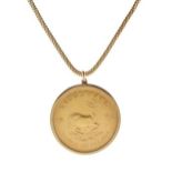 1974 Krugerrand, in a plain 9ct gold pendant mount, on a fancy link silver gilt chain, pendant