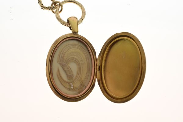 Victorian oval locket, unmarked, with applied garter motif, the glazed interior with styled lock - Image 4 of 7