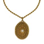 Gold diamond set locket, the brilliant cut of approximately 0.3 carats set to a pierced panel
