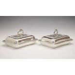 Pair of George V/George VI rectangular silver entrée dishes and covers, each having typical