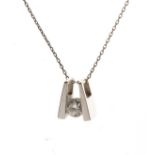 Unmarked white metal pendant set solitaire diamond on a fine white metal neck chain, 3g approx