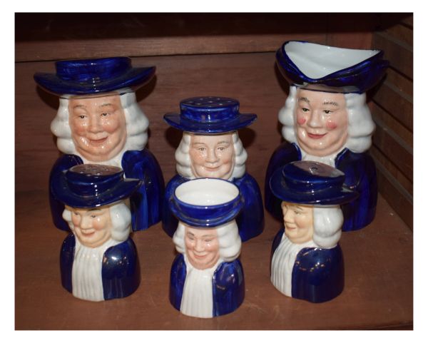 Group of six Wood & Sons pottery Quaker character ornaments comprising: money box, jug, sifter or