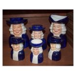 Group of six Wood & Sons pottery Quaker character ornaments comprising: money box, jug, sifter or
