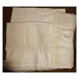 Two white cotton sheets or covers, each with lace/crochet trim Condition: