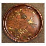 Japanese elm circular tray having gilt lacquered decoration depicting a bird amongst stylised