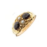 15ct gold ring set seed pearls and garnets, size L½, 2.1g approx gross Condition: