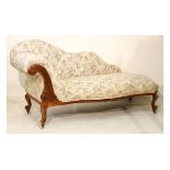 Late Victorian rosewood framed chaise longue upholstered in floral patterned simulated tapestry