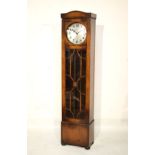 1920's period three weight chiming longcase clock with silvered circular Arabic dial and glazed long