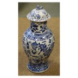 Chinese blue and white porcelain baluster jar and cover decorated with perching birds amongst