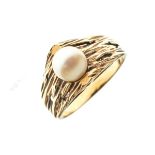 Unmarked yellow metal ring set single pearl, size M, 3.5g approx gross Condition: