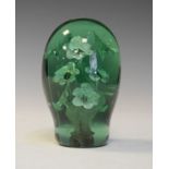 19th Century Nailsea type green glass dump internally decorated with a three tier vase of flowers