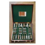 Modern plaster figural chess set with box/board Condition: