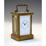 Small French brass cased carriage clock, the white enamel dial with Roman numerals Condition: