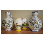 Pair of 19th Century Gien faience baluster shaped jugs, each having polychrome decoration