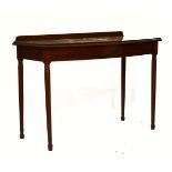 19th Century mahogany bowfront rectangular top side table standing on tapered turned supports