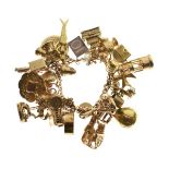 9ct gold charm bracelet, 120g approx gross Condition: