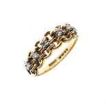 18ct gold ring, the open setting set five diamonds, size N, 4.1g approx gross Condition: