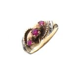 9ct gold ring set diamonds and red stones, size O½, 4.2g approx gross Condition: