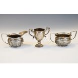 George III small silver two handled trophy cup, Birmingham 1930, together with an Indian white metal