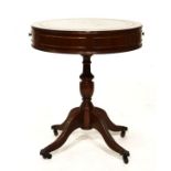 Reproduction mahogany occasional table of 'drum library' design with gilt tooled green skiver over
