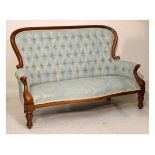Victorian style mahogany framed three seater drawing room settee upholstered in deep buttoned pale