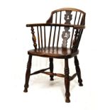 19th Century ash, elm and beech Windsor chair standing on turned supports united by stretchers