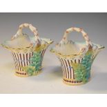 Pair of 19th Century Minton porcelain baskets, each decorated with ferns in relief, intertwined