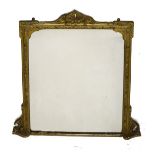 Late 19th/early 20th Century giltwood overmantel mirror with shaped arched plain mirror plate