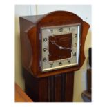 Art Deco style mahogany chiming grandmother clock with square Arabic dial Condition: