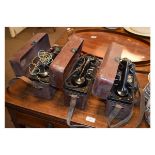 Three cased GPO field telephones, each with Bakelite handset in hinged heavy duty brown plastic case