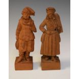 Pair of 19th Century French terracotta figures depicting a fisherman and his wife, each signed