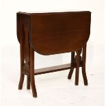 Early 20th Century mahogany Sutherland type table with rounded flaps on open vase shaped supports