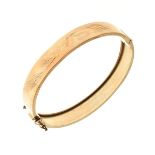 Engraved yellow metal snap bangle, stamped .375, 14g approx Condition: