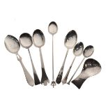 A.E. Jones hammered silver caddy spoon, Chester 1922, together with various other silver spoons,