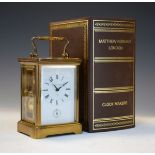 Matthew Norman brass cased carriage clock, white enamel dial with Roman numerals and subsidiary