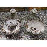 Two reconstituted garden planters, each of eight lobed design on spreading octagonal base Condition: