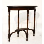 Early 20th Century oak oval occasional table, the moulded top on four turned supports, oval under