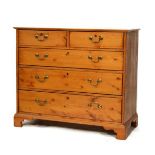Yellow pine chest of two short over three long drawers on bracket feet Condition: