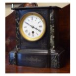 Late 19th Century black slate cased mantel clock, the white enamel dial with Roman numerals,