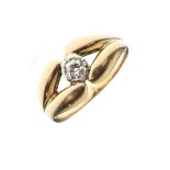 Unmarked yellow metal ring set solitaire diamond, size R, 9.4g approx gross Condition: