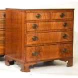 Reproduction Georgian style mahogany chest of two short and three long drawers, standing on