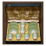 Crown Staffordshire six person coffee service having gilt highlighted white, cream and green