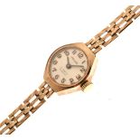 Lady's 9ct gold wristwatch, the circular Arabic dial marked Volvo, 17 jewels Incabloc, on gate