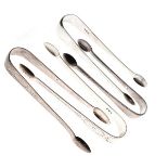 Four pairs of Georgian bright cut silver sugar tongs, combined weight 4.2oz approx Condition: