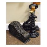 Cast iron figural doorstop formed as an Egyptian sphinx, another cast iron doorstop formed as an