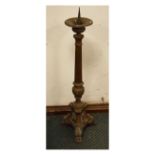 Brass alloy pricket candlestick with reeded column on triangular base with paw feet Condition: