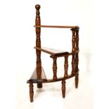 Reproduction mahogany set of library steps of quarter circular design with three treads on turned